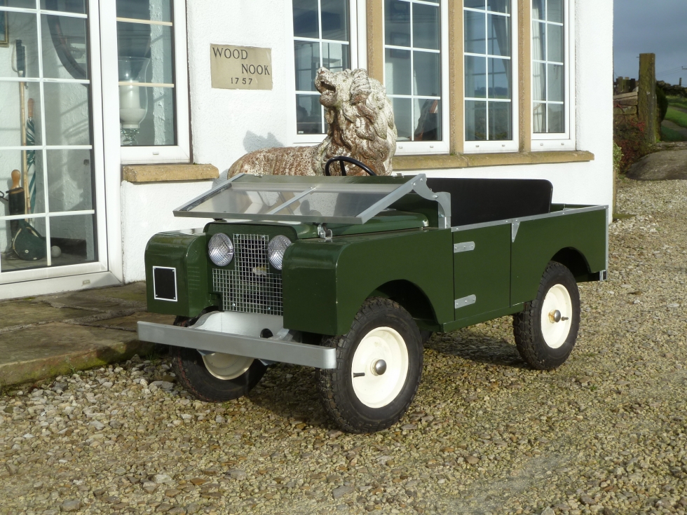 mint green land rover ride on